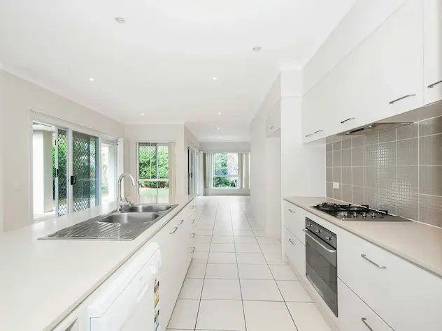 Fresh interior painting of walls and cabinets.
