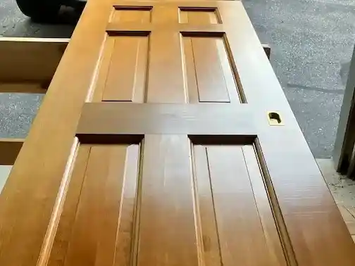 Refinishing stained wooden doors